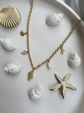 Chaîne Dorée Sirena – Acier inoxydable | Charms coquillage, étoile de mer & perle